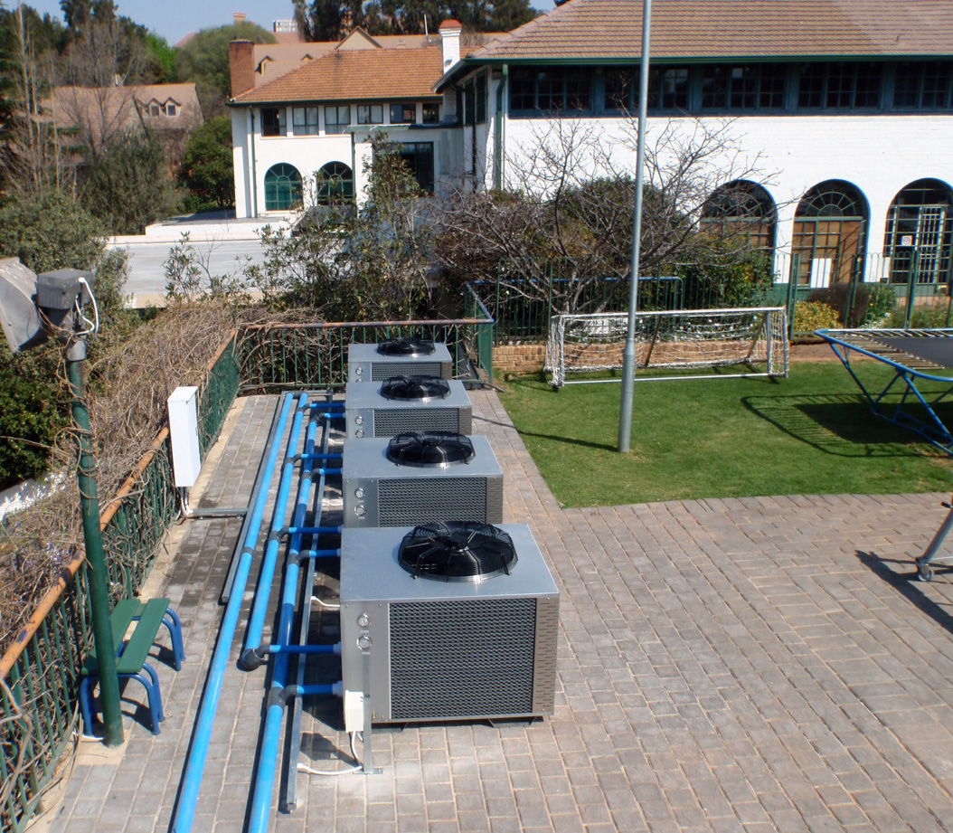 Multiple commercial pool heat pumps installed together